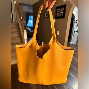 Beautiful mustard handbag.